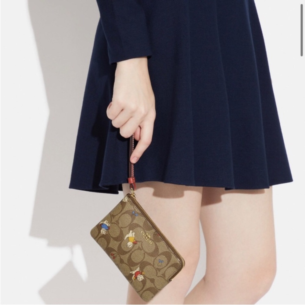 Authentic COACH Signature Cat Print Leather Wristlet